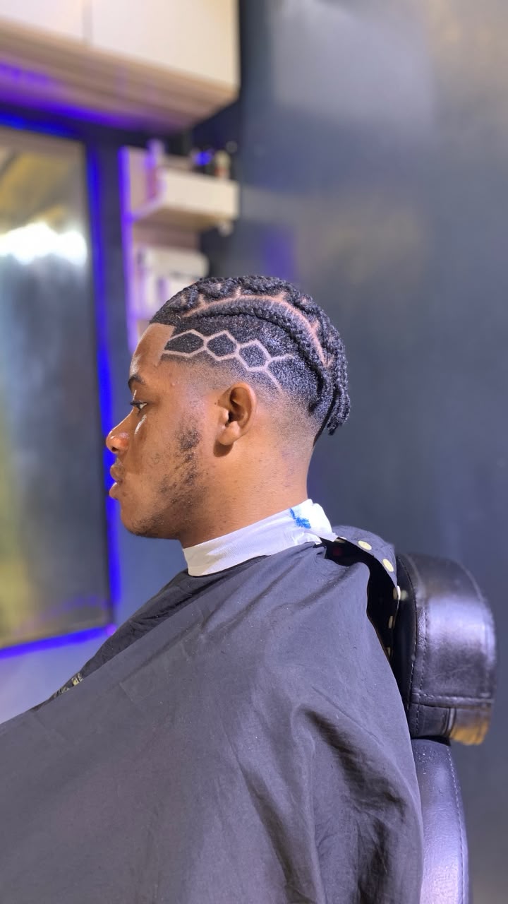 Side profile of a patterned braided hairstyle